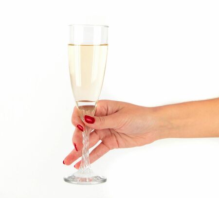 women Hand holding glass of champagneの写真素材