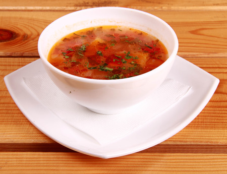 Bowl of Bright Red Creamy Tomato Soup with Yogurtの写真素材