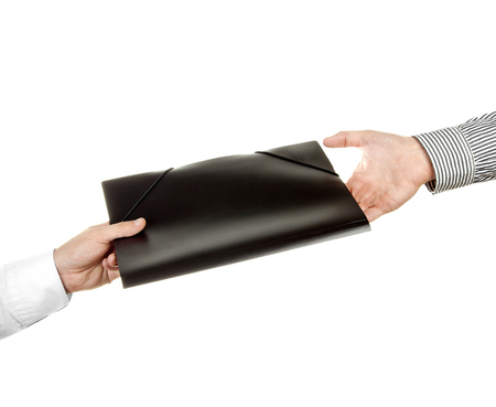 Hand holding a folderの写真素材
