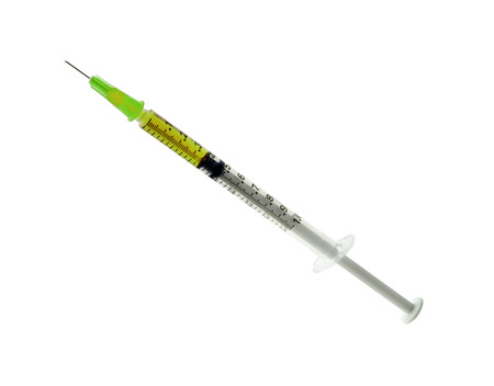 Glass syringe isolated on a whiteの写真素材