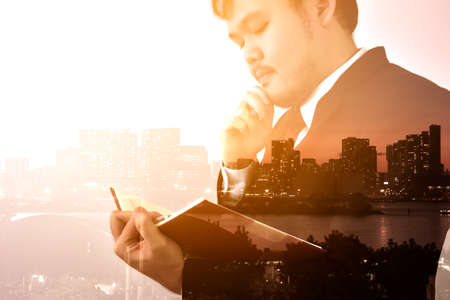 Businessman looking memo and Thinking for idea