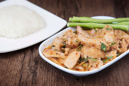 Thai dish called "Nam Tok Moo", Roasted pork and basil mixed, Thai food concept, International food conceptの写真素材