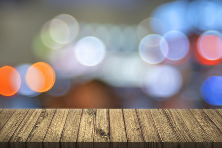 Empty table with colorful bokeh. 3D illustration. City light conceptの写真素材