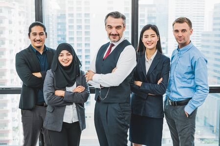 Portrait of business people group having confident in successful job in modern office background....