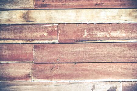 Closeup of old red brown wooden plank texture background. Wallpaper backdrop. Abstract wood floor and wall structure. Top view angle. Horizontal patternの写真素材