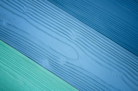 Top diagonal view of blue wooden textured background backdrop. Abstract wallpaper pastel blue ocean...