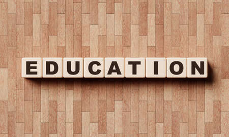 EDUCATION words from wooden blocks with letters. Learning courses and test for student and college...