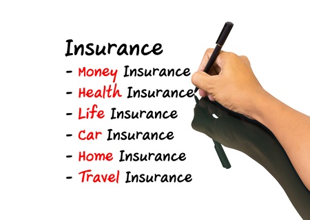 Business man writing insurance conceptの写真素材