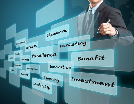 business man writing excellence conceptの写真素材