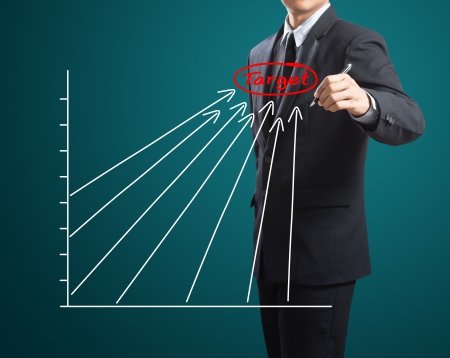 Business man drawing success chartの写真素材