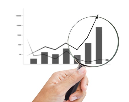 magnifying glass zoom on a business chartの写真素材