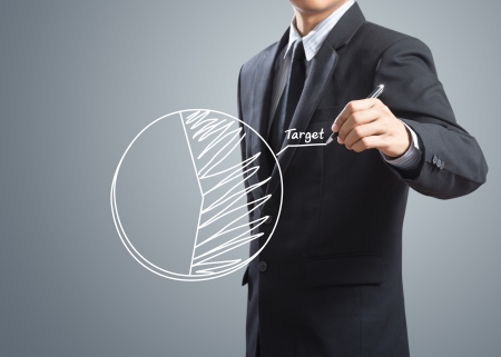 Businessman drawing target chartの写真素材