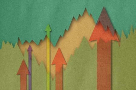 Business charts with growth arrowの写真素材