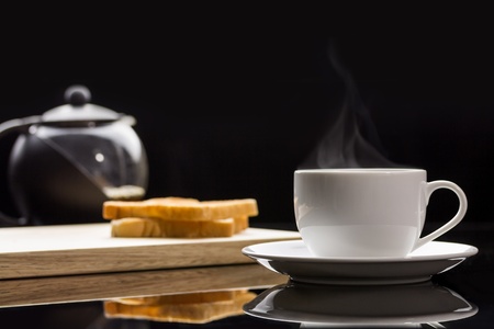 Cup of coffee and breadsの写真素材