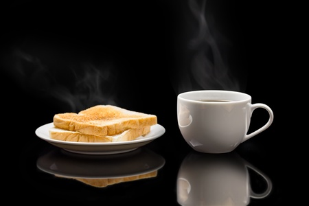 Cup of coffee and breadsの写真素材