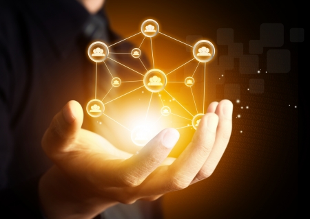 Male hand holding virtual icon of social networkの写真素材