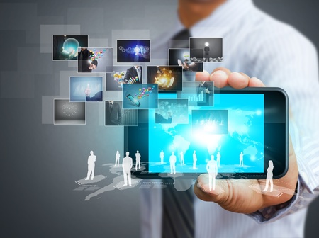 Touch screen mobile phone with business conceptの写真素材