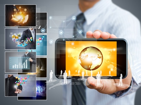 Touch screen mobile phone with business conceptの写真素材