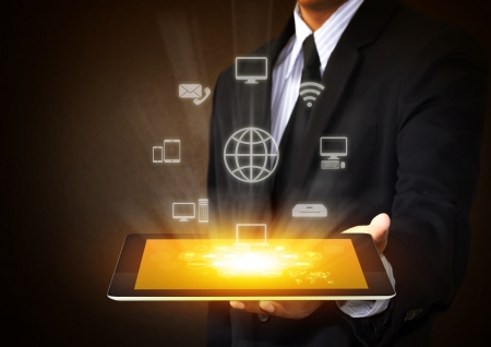 Touch screen tablet with cloud of  application iconsの写真素材
