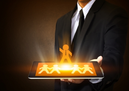 Tablet touch screen with leadership conceptの写真素材
