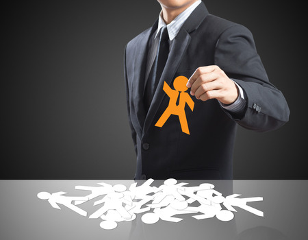 Human resources officer choose employee standing out of the crowd  Leadership conceptの写真素材