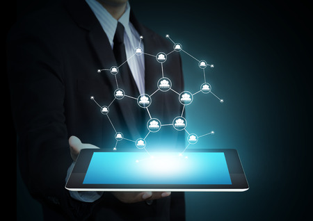 Modern wireless technology and social media on tabletの写真素材