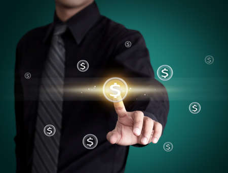 Business man pressing money iconの写真素材