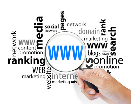 Magnifying glass searching internet domain, Global communication conceptの写真素材