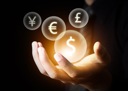International currencies on businessmanの写真素材