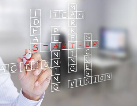 Businessman write business start-up diagram on wall glass, Planning conceptの写真素材