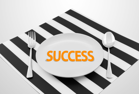 Successful concept on ready to serve dish with spoon and fork, Successful  conceptの写真素材