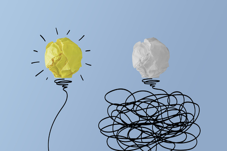 bright light bulb idea vs chaotic light bulbの写真素材