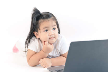 Asian girl working on computerの写真素材