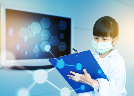 Asian child playing doctorの写真素材