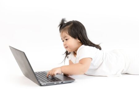 Asian girl working on computer