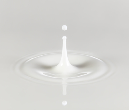 splashing milk dropの写真素材
