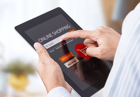businessman doing online shopping on tabletの写真素材
