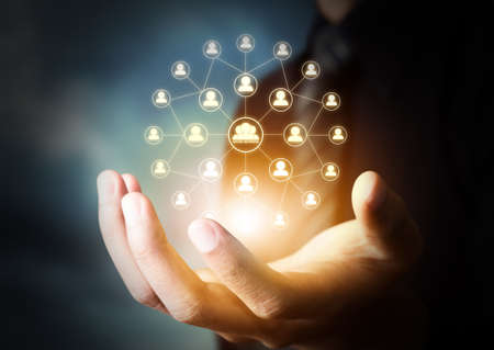 man hand holding social network icon, networking conceptの写真素材