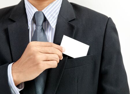 businessman showing white empty cardの写真素材