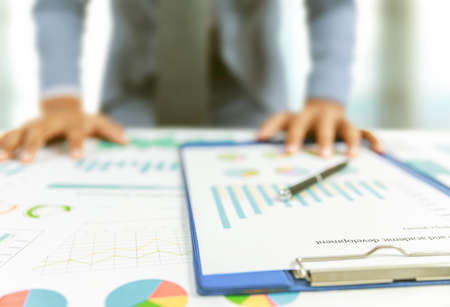 businessman write business plan with chartの写真素材