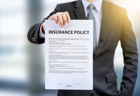 businessman show insurance policyの写真素材