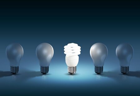 Glowing bright light bulb among others, different and leadership conceptの写真素材