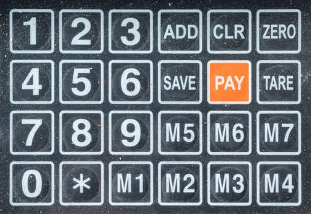 Numeric keys on digital scale, retail shop and groceryの写真素材