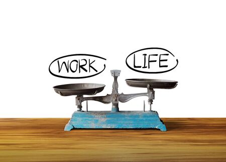 work life balance concept with scaleの写真素材