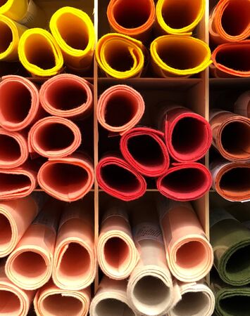 Colorful paper on shelfの写真素材