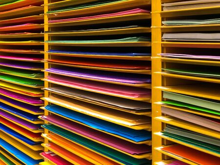 colorful paper on shelf, stationary and artの写真素材