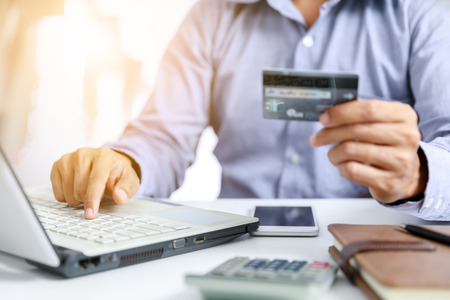 businessman do online shopping with credit cardの写真素材