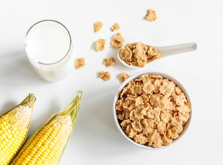 Healthy Corn Flakes with milk for Breakfast on tableの写真素材