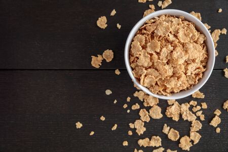 Healthy Corn Flakes with milk for Breakfast on tableの写真素材