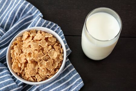 Healthy Corn Flakes with milk for Breakfast on tableの写真素材
